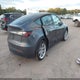 7SAYGDEE6NA011670 2022 Tesla Model Y Long Range Dual Motor All-Wheel Drive auction photo thumbnail 4