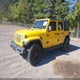 1C4HJXEG4KW536741 2019 Jeep Wrangler Unlimited Sahara 4X4 auction photo thumbnail 2
