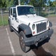 1J4BA3H12AL170892 2010 Jeep Wrangler Unlimited Sport auction photo thumbnail 1