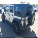 1J4BA3H12AL170892 2010 Jeep Wrangler Unlimited Sport auction photo thumbnail 3