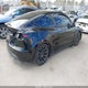 7SAYGDEE5PA094933 2023 Tesla Model Y Awd/Long Range Dual Motor All-Wheel Drive auction photo thumbnail 4