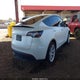7SAYGDEE8NA012383 2022 Tesla Model Y Long Range Dual Motor All-Wheel Drive auction photo thumbnail 4