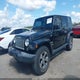1C4BJWEG0GL167546 2016 Jeep Wrangler Unlimited Sahara auction photo thumbnail 2