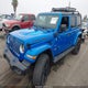 1C4JJXP63PW579805 2023 Jeep Wrangler 4Xe Sahara 4X4 auction photo thumbnail 2
