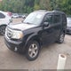 5FNYF4H61AB022075 2010 Honda Pilot Ex-L auction photo thumbnail 2