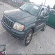 1J8GW68J13C513878 2003 Jeep Grand Cherokee Overland auction photo thumbnail 2