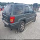 1J8GW68J13C513878 2003 Jeep Grand Cherokee Overland auction photo thumbnail 4