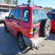 2CNBJ13C016905909 2001 Chevrolet Tracker Hard Top Base auction photo thumbnail 3