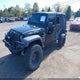 1C4BJWDG8EL207743 2014 Jeep Wrangler Unlimited Sport auction photo thumbnail 2