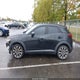 JM1DKDC73K0445136 2019 Mazda Cx-3 Touring auction photo thumbnail 14