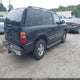 1GNEK13Z43J166270 2003 Chevrolet Tahoe Lt auction photo thumbnail 4