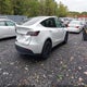7SAYGDEE6PA164777 2023 Tesla Model Y Awd/Long Range Dual Motor All-Wheel Drive auction photo thumbnail 4