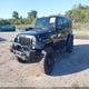 1C4BJWEG4EL257327 2014 Jeep Wrangler Unlimited Altitude auction photo thumbnail 2