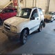 2CNBE18C536948688 2003 Chevrolet Tracker auction photo thumbnail 2