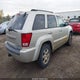 1J4RR4GT0AC146123 2010 Jeep Grand Cherokee Laredo auction photo thumbnail 4