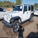 1C4BJWDG5GL347865 2016 Jeep Wrangler Unlimited Sport auction photo thumbnail 2
