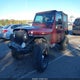 1J4FA59S71P376013 2001 Jeep Wrangler Sahara auction photo thumbnail 2
