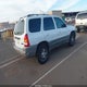 4F2UU07B31KM12254 2001 Mazda Tribute Dx auction photo thumbnail 4