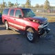 1GNEC16ZX2J235759 2002 Chevrolet Suburban 1500 Ls auction photo thumbnail 1