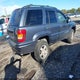 1J4GW48S74C337810 2004 Jeep Grand Cherokee Laredo auction photo thumbnail 4