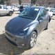 7SAYGDEE5PF914785 2023 Tesla Model Y Awd/Long Range Dual Motor All-Wheel Drive auction photo thumbnail 2