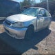 1HGEJ8245XL033524 1999 Honda Civic Ex auction photo thumbnail 2