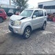 5FNYF4H50BB042987 2011 Honda Pilot Ex-L auction photo thumbnail 2