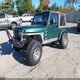 1J4FA59S31P362769 2001 Jeep Wrangler Sahara auction photo thumbnail 2