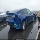 7SAYGDEE7PF664045 2023 Tesla Model Y Awd/Long Range Dual Motor All-Wheel Drive auction photo thumbnail 4