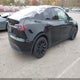 7SAYGDEE0PF792255 2023 Tesla Model Y Awd/Long Range Dual Motor All-Wheel Drive auction photo thumbnail 4