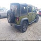 1J4BA3H13AL225625 2010 Jeep Wrangler Unlimited Sport auction photo thumbnail 4