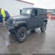 1C4BJWDGXGL190401 2016 Jeep Wrangler Unlimited Sport auction photo thumbnail 2