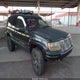 1J8GW58N24C309329 2004 Jeep Grand Cherokee Limited auction photo thumbnail 1