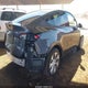 7SAYGDEE0PF877614 2023 Tesla Model Y auction photo thumbnail 4
