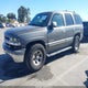 1GNEK13T71J298450 2001 Chevrolet Tahoe Lt auction photo thumbnail 2