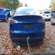 7SAYGAEE2PF606763 2023 Tesla Model Y Awd/Long Range Dual Motor All-Wheel Drive auction photo thumbnail 16