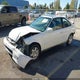 1HGEJ824XYL089802 2000 Honda Civic Ex auction photo thumbnail 2