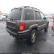 1J4GW68N2XC597168 1999 Jeep Grand Cherokee Limited auction photo thumbnail 4