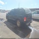 1GNEK13Z12R138197 2002 Chevrolet Tahoe Lt auction photo thumbnail 3