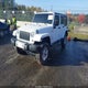1C4BJWEG0EL312386 2014 Jeep Wrangler Unlimited Sahara auction photo thumbnail 2