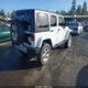 1C4BJWEG0EL312386 2014 Jeep Wrangler Unlimited Sahara auction photo thumbnail 4
