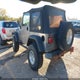 1J4FA49S12P717501 2002 Jeep Wrangler Sport auction photo thumbnail 3