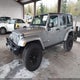 1C4BJWEG8GL327687 2016 Jeep Wrangler Unlimited Sahara auction photo thumbnail 2