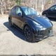 7SAYGAEE4PF642258 2023 Tesla Model Y Awd/Long Range Dual Motor All-Wheel Drive auction photo thumbnail 1