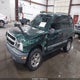2CNBE134346909566 2004 Chevrolet Tracker auction photo thumbnail 2