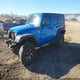 1C4BJWDG7FL599387 2015 Jeep Wrangler Unlimited Willys Wheeler auction photo thumbnail 2