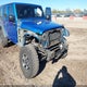 1C4BJWDG7FL599387 2015 Jeep Wrangler Unlimited Willys Wheeler auction photo thumbnail 6