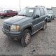 1J8GW68J12C167121 2002 Jeep Grand Cherokee Overland auction photo thumbnail 2