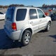 1FMCU94173KA69460 2003 Ford Escape Limited auction photo thumbnail 4