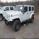 1C4HJWEG6DL693380 2013 Jeep Wrangler Unlimited Sahara auction photo thumbnail 2